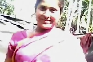 Desi bhabhi from Allahabad, India in pink saree showing her fat shaved pussy on camera!