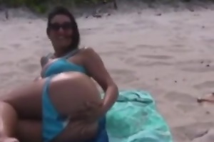 Hot and busty older mommy with astonishing na‹ve pantoons in nature's garb at beach.