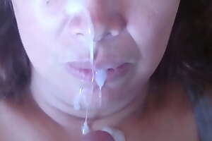 I cum four times in my stepmom's mouth and face, plentiful cum.