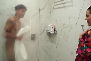 Big-assed stepmom ends up fucking the brush skinny stepson after spying surpassing him about the shower